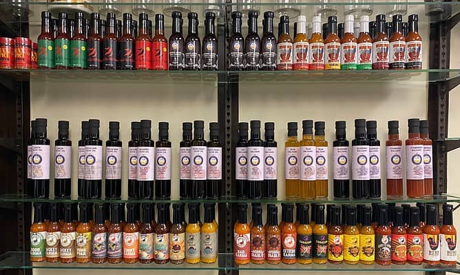 Flower City Flavor Company inside Twelve Corners Apothecary display of products